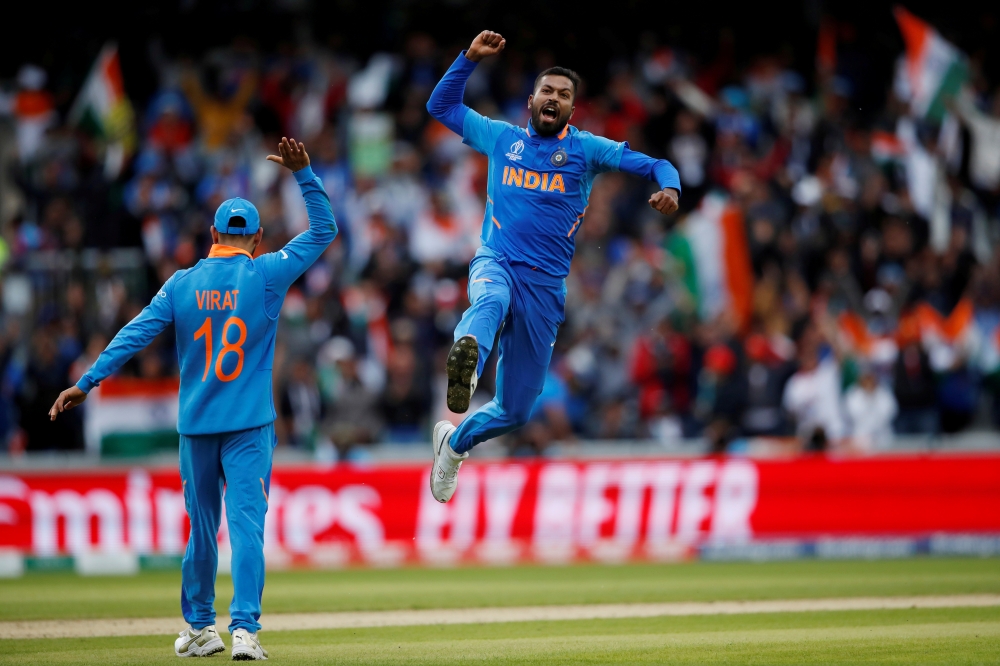 India's Hardik Pandya celebrates taking the wicket of Pakistan's Shoaib Malik during the ICC Cricket World Cup match  at the Emirates Old Trafford, Manchester, Britain on Sunday. — Reuters