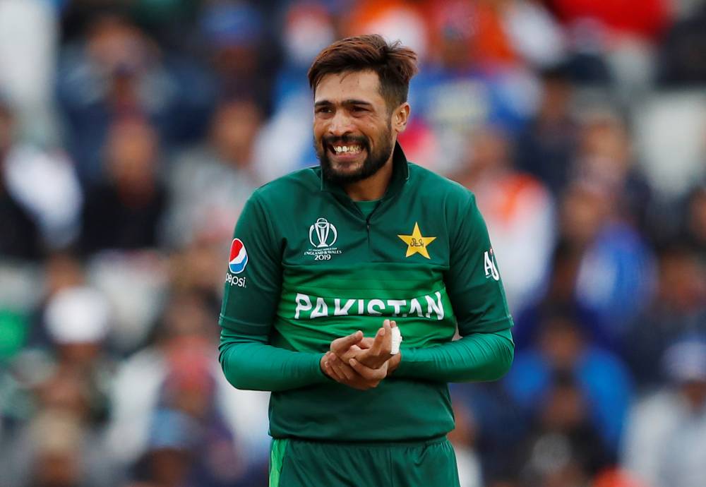 Pakistan's Mohammad Amir and India's Virat Kohli during the ICC Cricket World Cup match at Emirates Old Trafford, Manchester, Britain, on Sunday. — Reuters