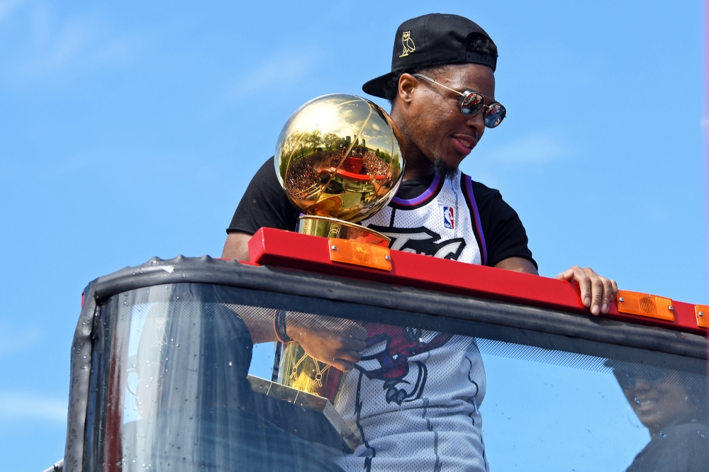 Picture of the 2019 NBA Champions logo on the bus as the Toronto Raptors  hold their victory parade after beating the Golden State Warriors in the NBA  Finals in Toronto. June 17