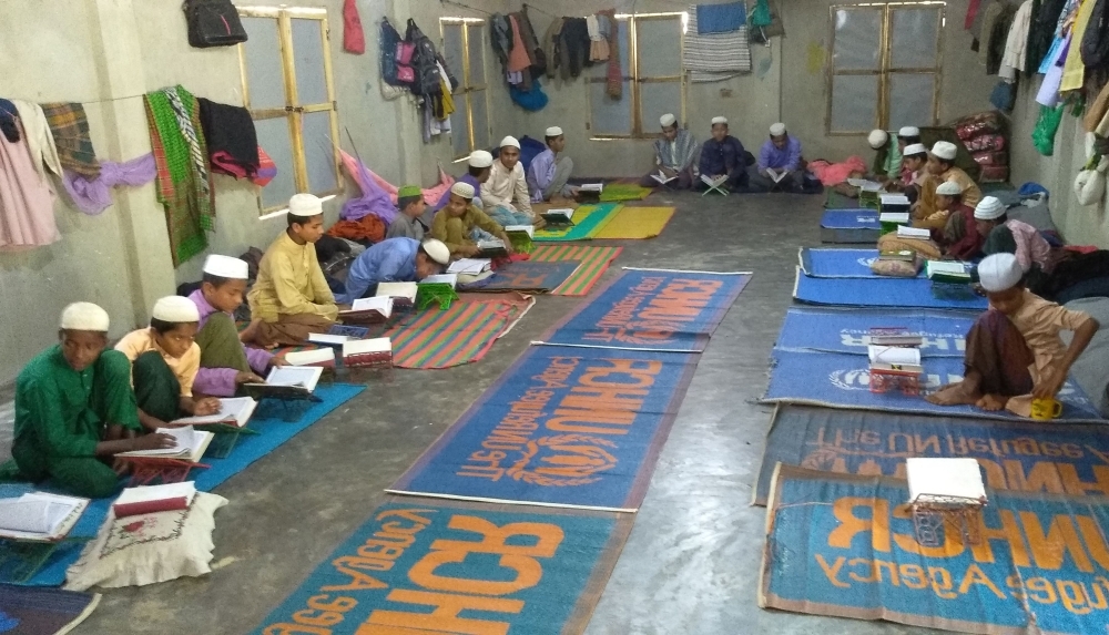 Rohingya refugee children learn the holy Qur'an in a madrasa in a Rohingya refugee camp in Ukhia, Bangladesh, in this March 21, 2019 file photo. — AFP