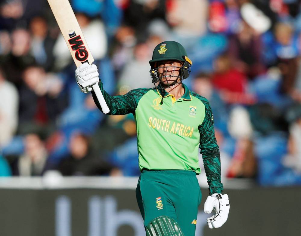 South Africa's Quinton de Kock celebrates a half century  during the ICC Cricket World Cup match against Afghanistan at Cardiff Wales Stadium, Cardiff, Britain. — Reuters