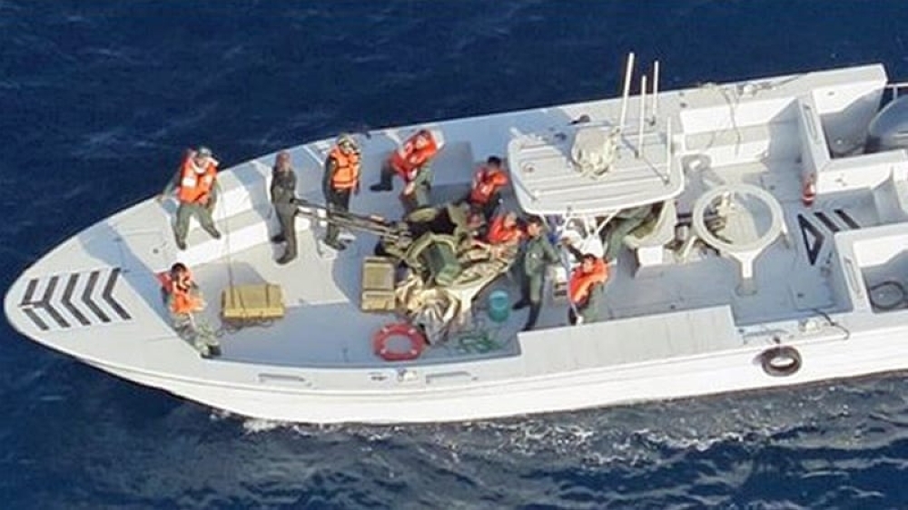 A handout photo made available by the US Department of Defense (DoD) on Monday shows an Iranian patrol boat armed with a Russian-made ZU-23-2, a twin-barreled anti-aircraft cannon, after reportedly removing an 