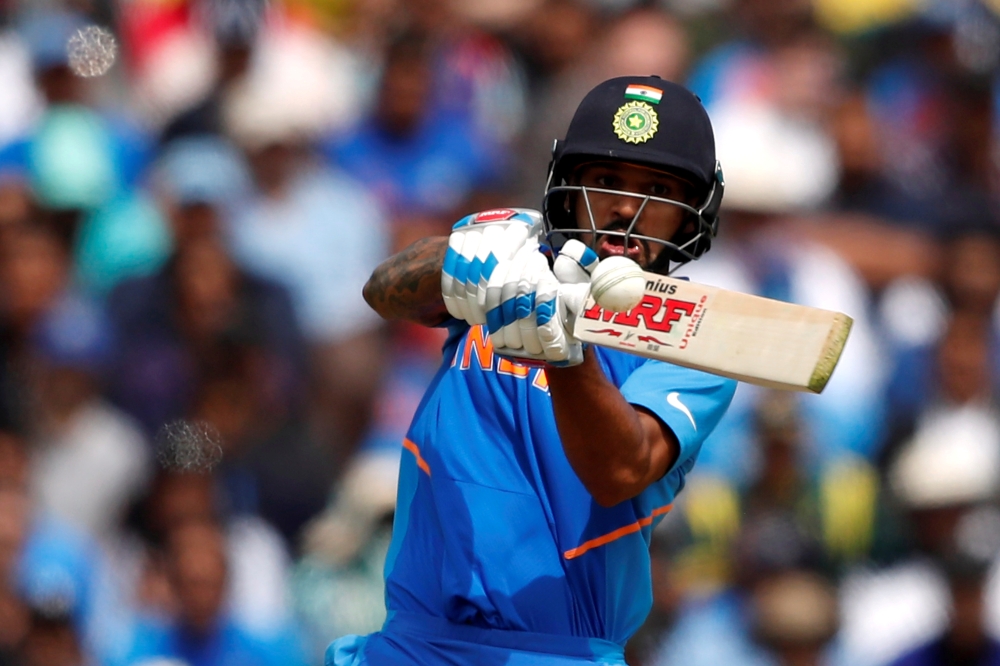 India's Shikhar Dhawan hits a four during the ICC Cricket World Cup match against Australia at The Oval, London, Britain. — Reuters