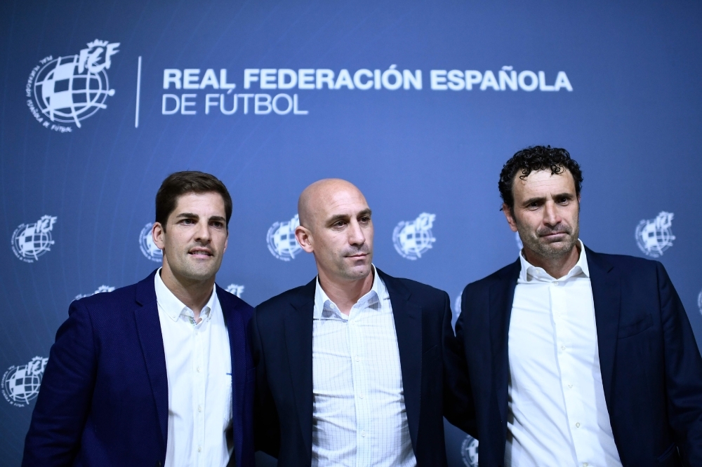 Spanish Royal Spanish Football Federation (RFEF) president Luis Rubiales (C), Spain's sporting director Jose Francisco Molina (R) and Spain´s newly appointed coach Robert Moreno (L) pose before giving a press conference on Wednesday at Las Rozas football sports city near Madrid. Luis Enrique stepped down as Spain coach and is replaced by assistant Robert Moreno. — AFP