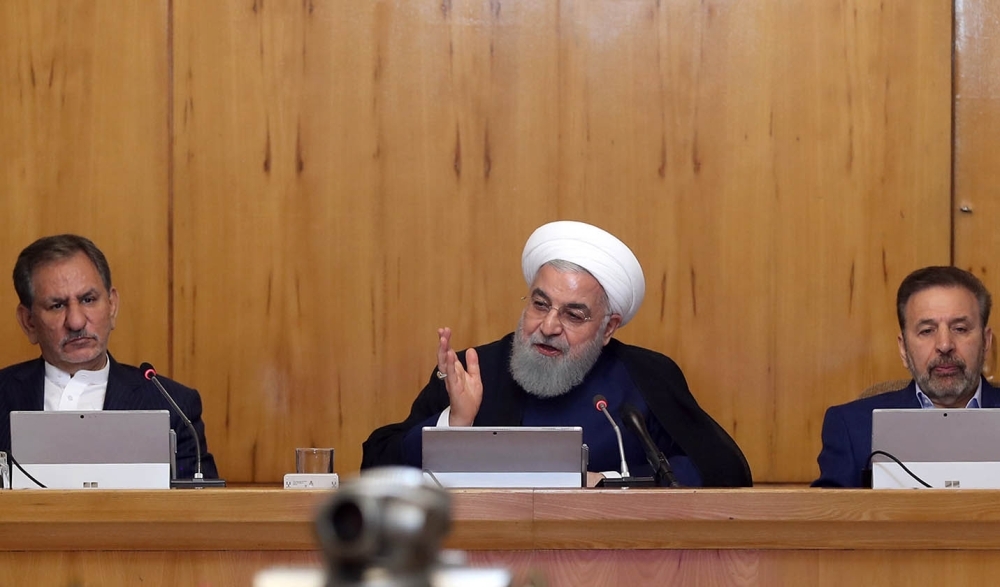 President Hassan Rohani (C) and Iran's First Vice President Eshaq Jahangiri (C) attending a cabinet meeting in Tehran. — AFP