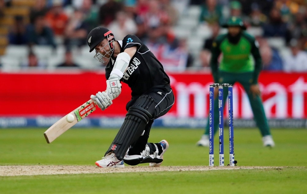 New Zealand's Kane Williamson scores a six to reach a century  against South Africa during the ICC Cricket World Cup match at Edgbaston, Birmingham, Britian, on Wednesday. — Reuters