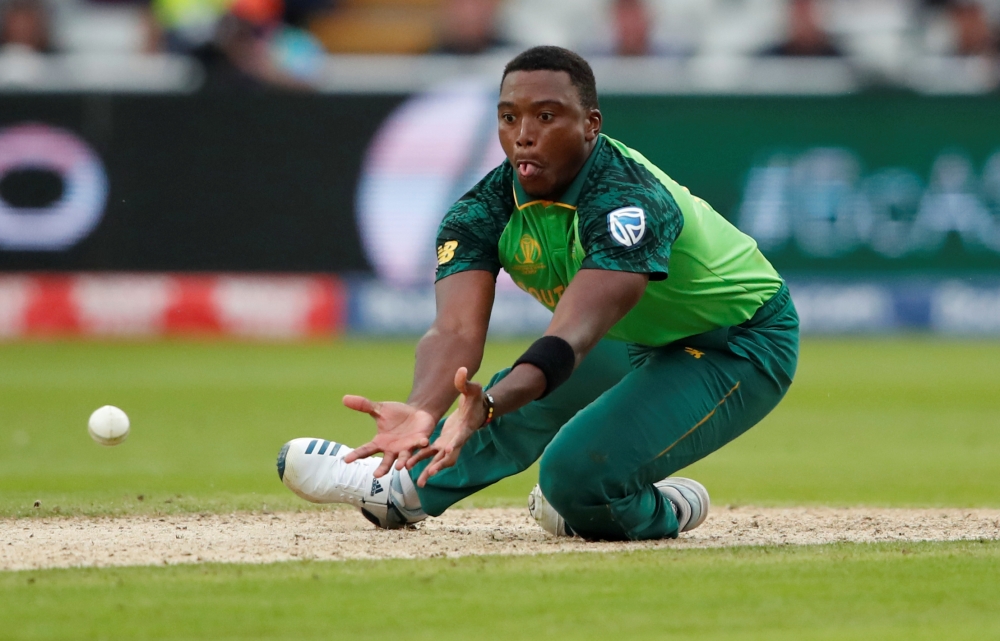 New Zealand's Kane Williamson scores a six to reach a century  against South Africa during the ICC Cricket World Cup match at Edgbaston, Birmingham, Britian, on Wednesday. — Reuters