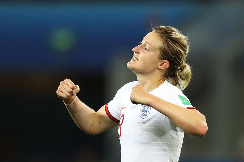 England's forward Ellen White (C) celebrates after scoring her second goal  during the France 2019 Women's World Cup Group D football match between Japan and England, on Wednesday, at the Nice Stadium in Nice, southeastern France. — AFP