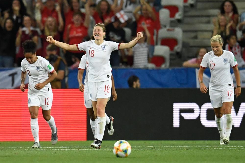 England's forward Ellen White (C) celebrates after scoring her second goal  during the France 2019 Women's World Cup Group D football match between Japan and England, on Wednesday, at the Nice Stadium in Nice, southeastern France. — AFP