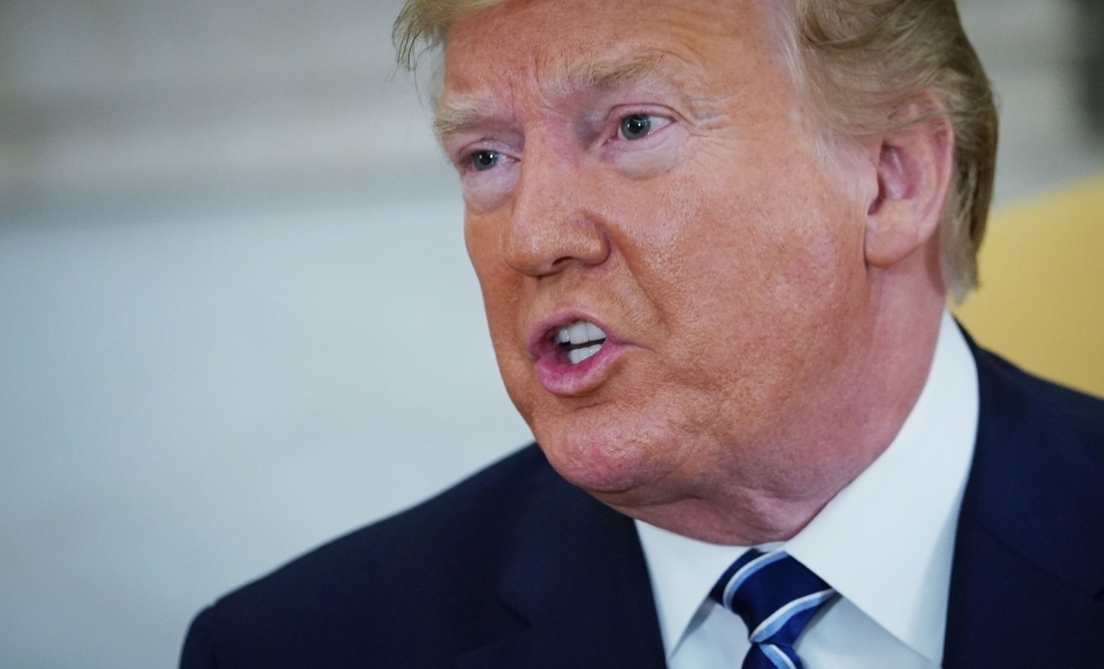 USS President Donald Trump speaks in the Oval Office of the White House in Washington on Thursday. — AFP