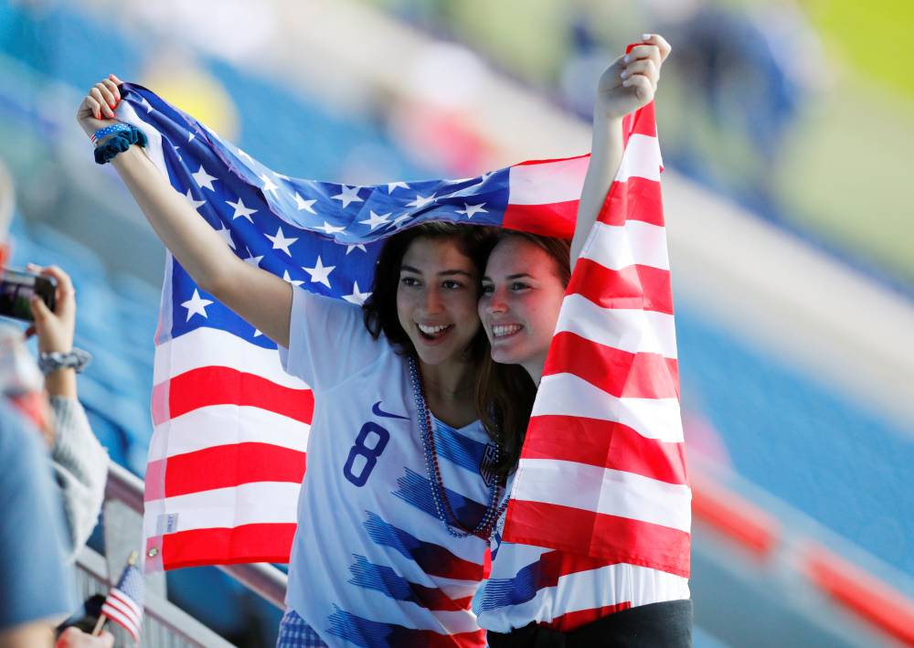 United States fans pose inside the stadium before the Women's World Cup Group F match against Sweden at the Stade Oceane, Le Havre, France, on Thursday. — Reuters