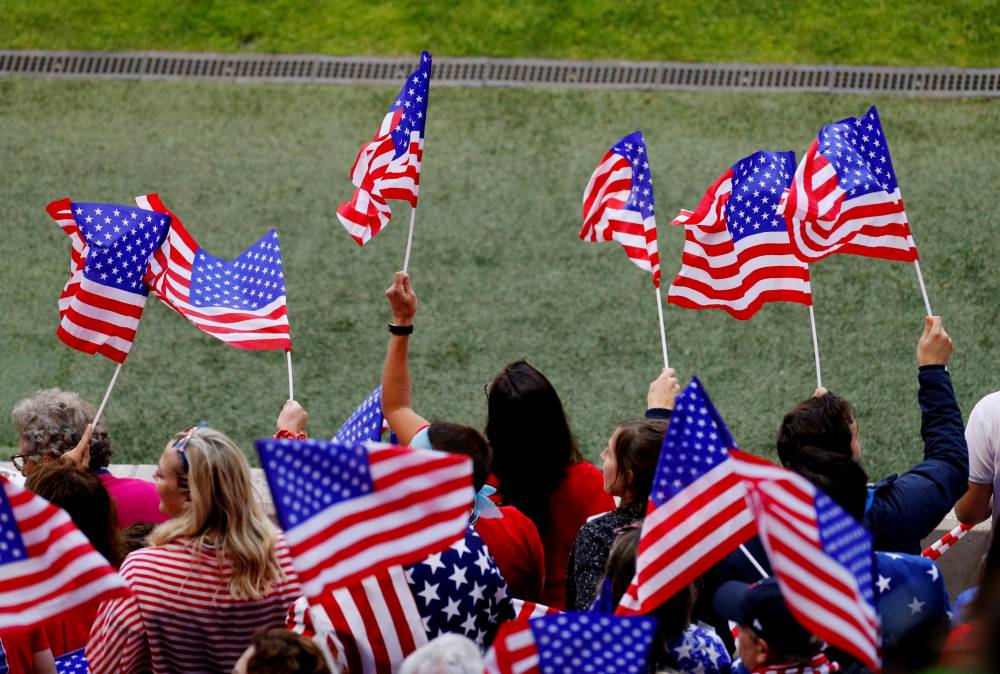 United States fans pose inside the stadium before the Women's World Cup Group F match against Sweden at the Stade Oceane, Le Havre, France, on Thursday. — Reuters