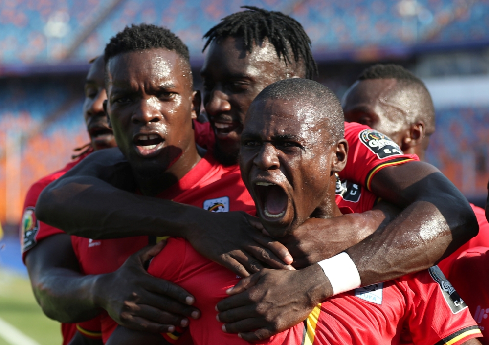 Uganda's Patrick Kaddu celebrates scoring their first goal with teammates against DR Congo during the 2019 Africa Cup of Nations (CAN) football match at Cairo International Stadium on Saturday. — Reuters
