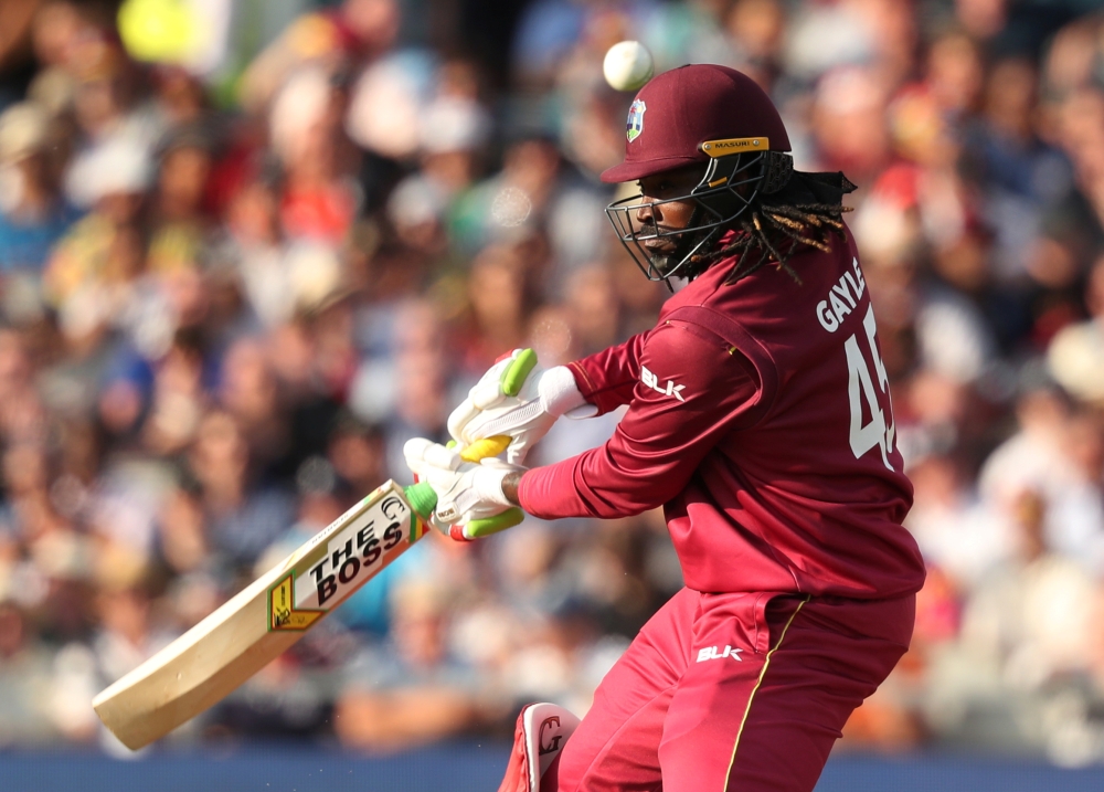 West Indies' Carlos Brathwaite looks dejected after losing his wicket and the match against New Zealand in the ICC Cricket World Cup match at the Old Trafford, Manchester, Britain, on Saturday. — Reuters