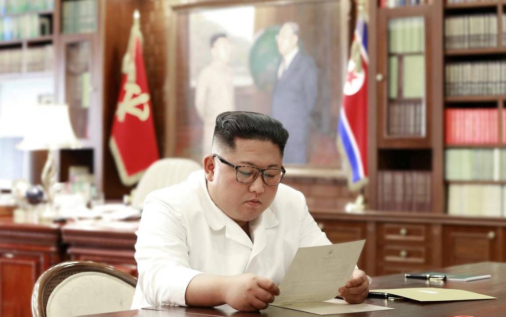 North Korean leader Kim Jong Un reads a letter from US President Donald Trump, in Pyongyang, North Korea in this picture released by North Korea’s Korean Central News Agency (KCNA) on Saturday. - Reuters