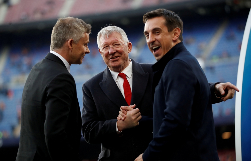 Manchester United manager Ole Gunnar Solskjaer, Alex Ferguson and Gary Neville before the Champions League quarterfinal second leg match against Barcelona at Camp Nou in this April 16, 2019, file photo. — Reuters 