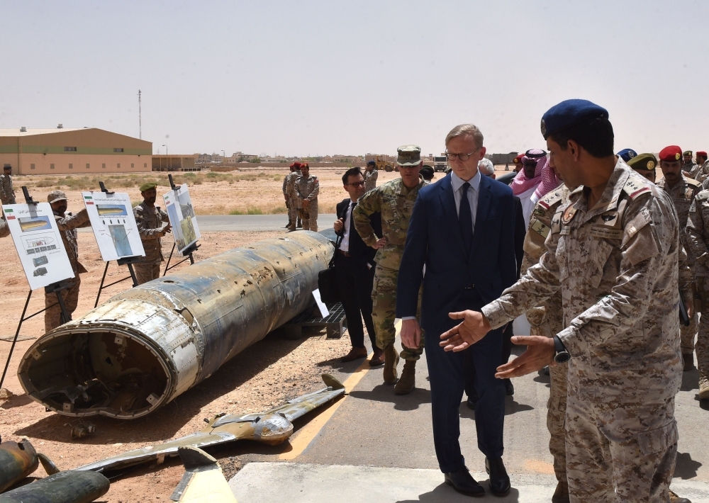 Brian Hook (2nd R), the US special representative on Iran, checks Iranian-made Houthi missiles and drones intercepted over Saudi territory and the remnants of a 