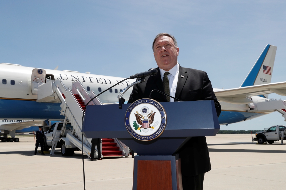 US Secretary of State Mike Pompeo speaks to the media at Joint Base Andrews, Maryland, on Sunday before boarding a plane headed to Jeddah. — Reuters