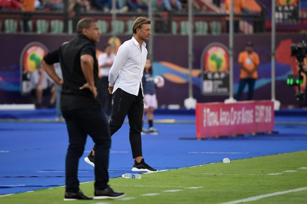 CNN Sports on X: No socks? Interesting. 🤔 Is Morocco coach Herve Renard a  *shoe-in* for the best dressed coach award? #WorldCup #MARIRN   / X
