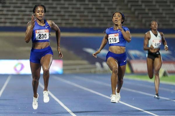 Olympic champion Elaine Thompson passes Shelly-Ann Fraser-Pryce to surge home to regain the half-lap title she last won in 2015.