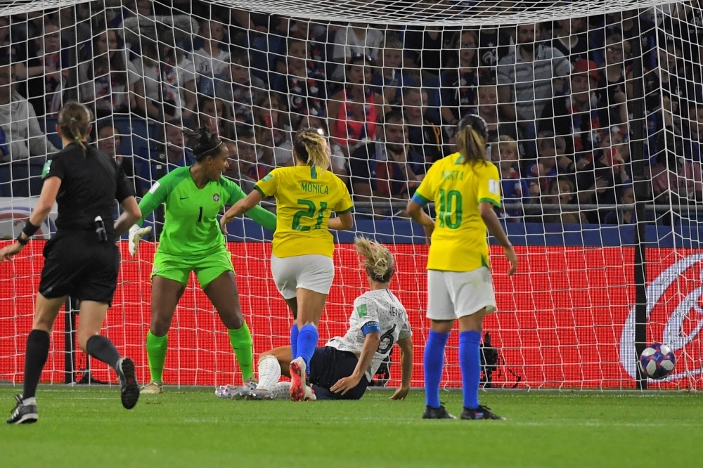 France's midfielder Amandine Henry (C) scores her team's second goal during the France 2019 Women's World Cup round of sixteen football match against Brazil, on Sunday, at the Oceane stadium in Le Havre, north western France. — AFP