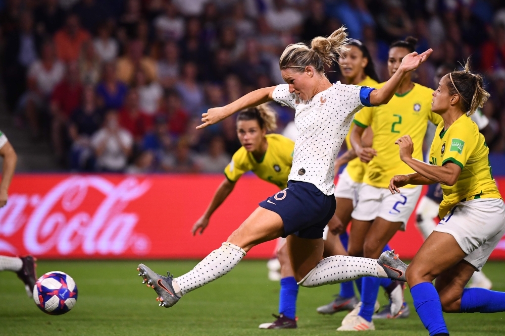 France's midfielder Amandine Henry (C) scores her team's second goal during the France 2019 Women's World Cup round of sixteen football match against Brazil, on Sunday, at the Oceane stadium in Le Havre, north western France. — AFP