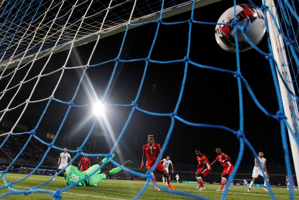 Algeria's Riyad Mahrez scores their second goal    during the 2019 Africa Cup of Nations (CAN) football match against Kenya at the 30 June Stadium in Cairo on Sunday. — Reuters