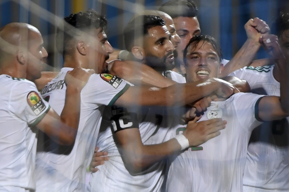 Algeria's Riyad Mahrez scores their second goal    during the 2019 Africa Cup of Nations (CAN) football match against Kenya at the 30 June Stadium in Cairo on Sunday. — Reuters