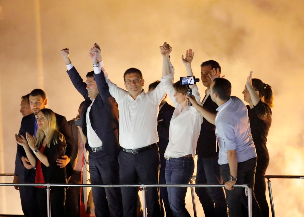 Ekrem Imamoglu, center, mayoral candidate of the main opposition Republican People's Party (CHP), greets supporters at a rally of in Beylikduzu district, in Istanbul, Turkey, in this June 23, 2019 file photo. — Reuters