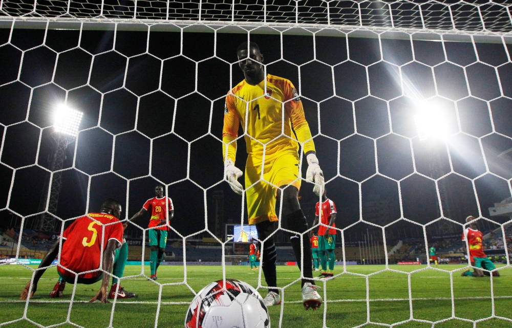 Guinea-Bissau's Jonas Mendes reacts after conceding a goal during the 2019 Africa Cup of Nations (CAN) football match against Caneroon at the Ismailia Stadium on Tuesday. — Reuters