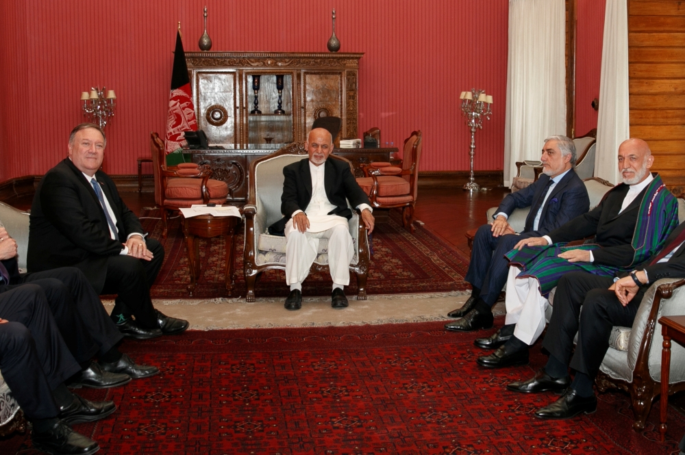 Secretary of State Mike Pompeo meets with Afghan President Ashraf Ghani, Afghan Chief Executive Officer Abdullah Abdullah, and former Afghan President Hamid Karzai at the Presidential Palace in Kabul on Tuesday. — Reuters
