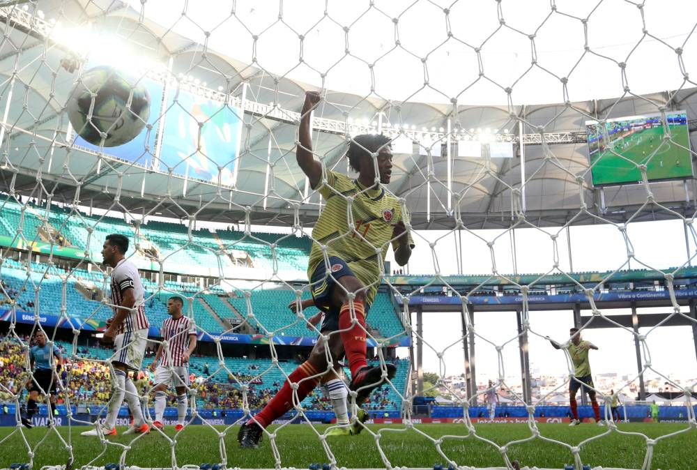 Colombia's Juan Cuadrado celebrates after Gustavo Cuellar (not pictured) scores their first goal against Paraguay in the Copa America Brazil 2019 Group B match at Arena Fonte Nova, Salvador, Brazil on Sunday. — Reuters