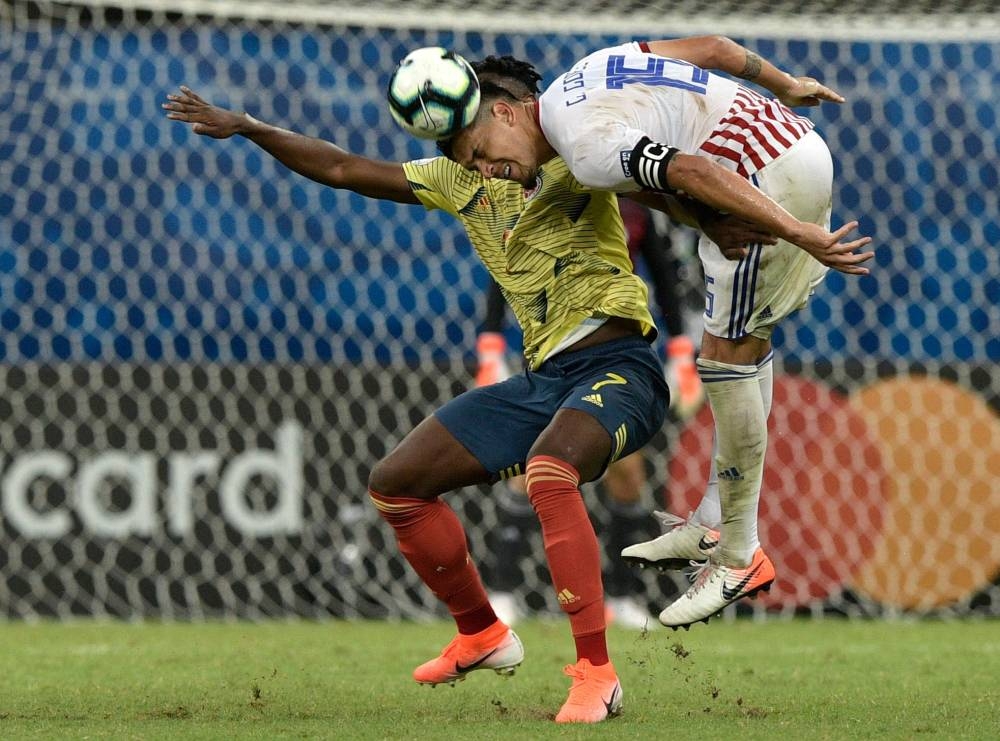 Colombia's Juan Cuadrado celebrates after Gustavo Cuellar (not pictured) scores their first goal against Paraguay in the Copa America Brazil 2019 Group B match at Arena Fonte Nova, Salvador, Brazil on Sunday. — Reuters