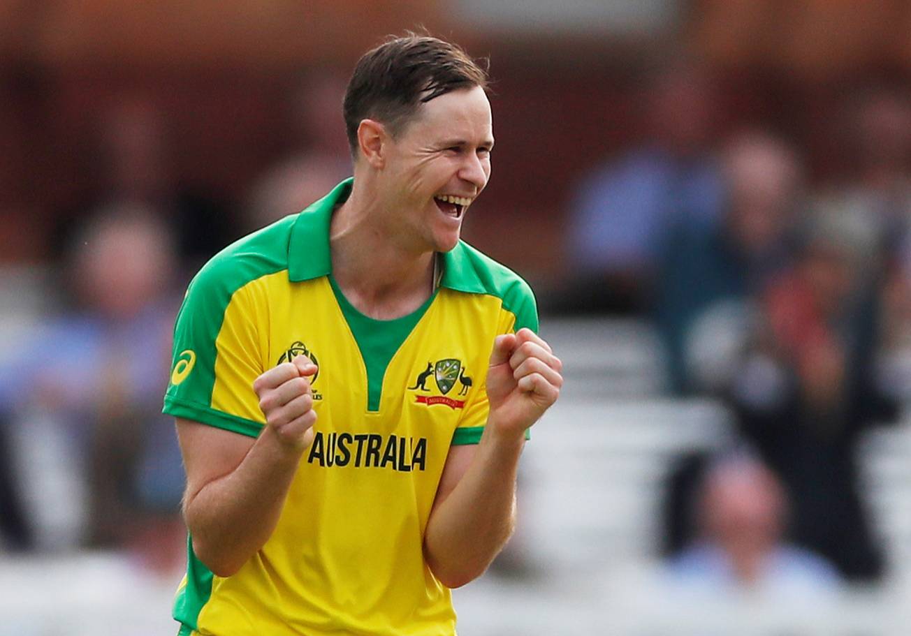 Australia's Jason Behrendorff celebrates taking the wicket of England's Jofra Archer during the ICC Cricket World Cup match at Lord's Cricket Ground, London, Britain on Tuesday. — Reuters