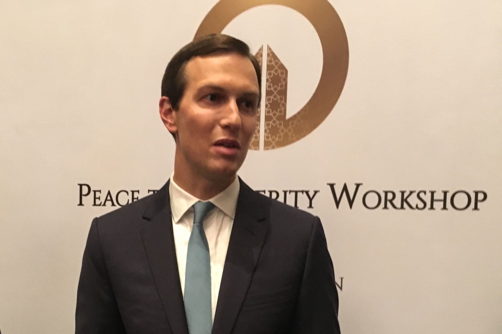 Jared Kushner, President Donald Trump's son-in-law and adviser, speaks to reporters as he closes the US-sponsored Middle East economic conference 