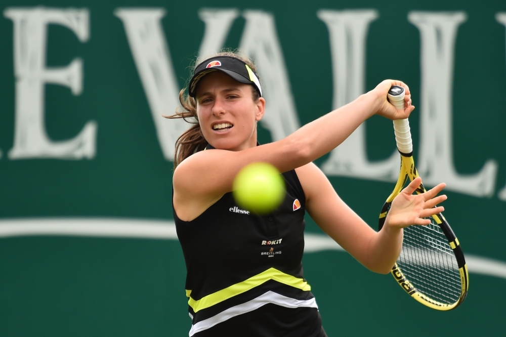 Britain's Johanna Konta returns against Tunisia's Ons Jabeur during their women's round of 16 match at the WTA Nature Valley International tennis tournament in Eastbourne, southern England on Wednesday. — AFP