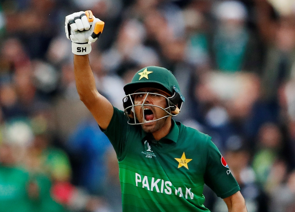 Pakistan's Babar Azam celebrates after winning the ICC Cricket World Cup match against New Zealand at the Edgbaston, Birmingham, Britian on Wednesday. — Reuters