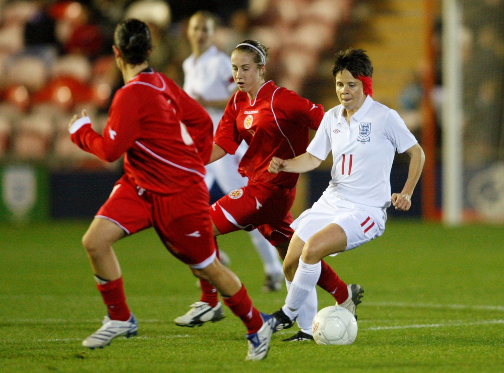 England's Sue Smith (R) in action against Malta's Rachael Cuschieri during the 2011 FIFA Women's World Cup Qualifying European Zone Group Five match at the Bloomfield Road, Blackpool in this Oct. 25, 2009, file photo. — Reuters