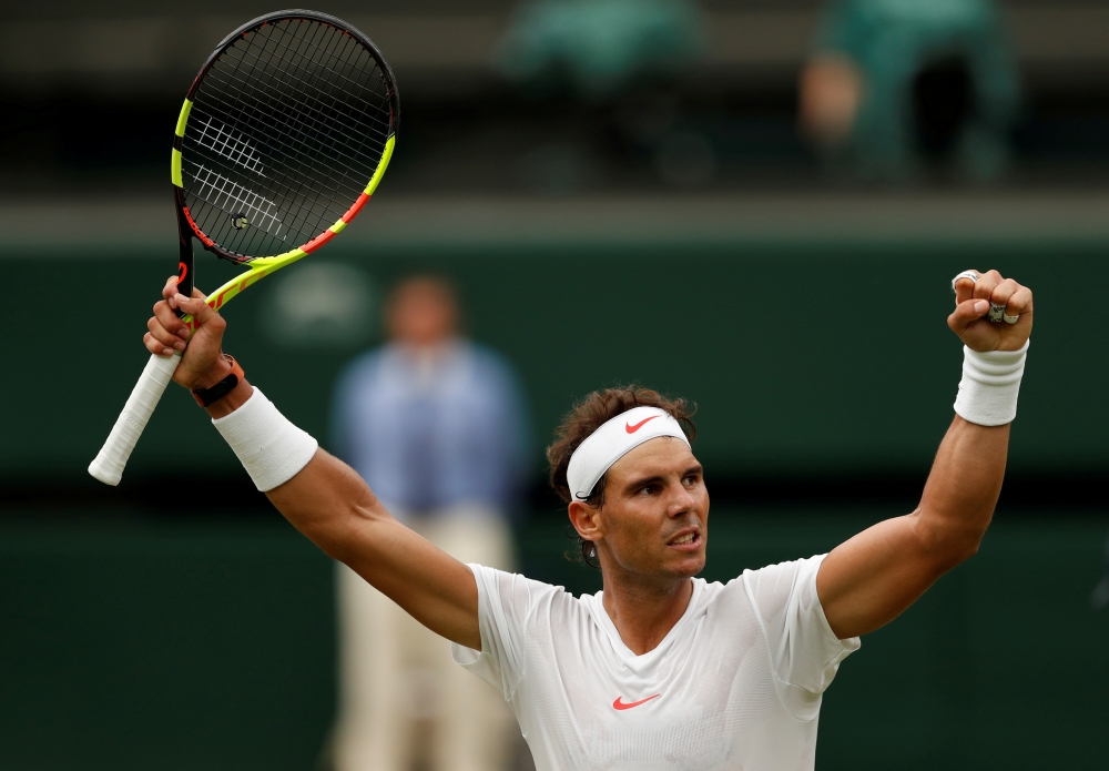 Spain's Rafael Nadal celebrates during his Wimbledon semifinal match against Serbia's Novak Djokovic at the All England Lawn Tennis and Croquet Club, London, Britain in this July 14, 2018, file photo. — Reuters