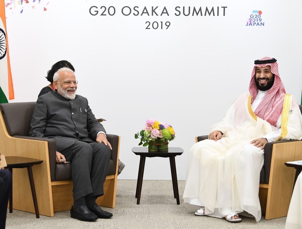 Crown Prince Muhammad Bin Salman meets with Indian Prime Minister Narendra Modi during the G20 Summit in Osaka on Friday. — AFP