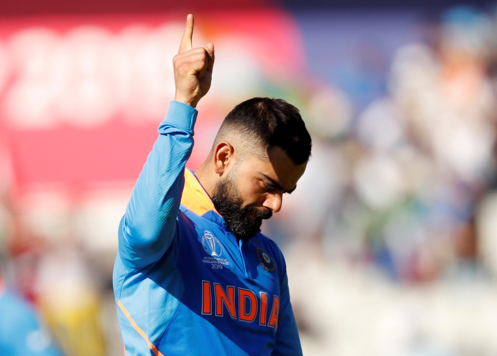 India's Virat Kohli celebrates after the match during the ICC Cricket World Cup match against West Indies at the Old Trafford, Manchester, Britain on Thursday. — Reuters