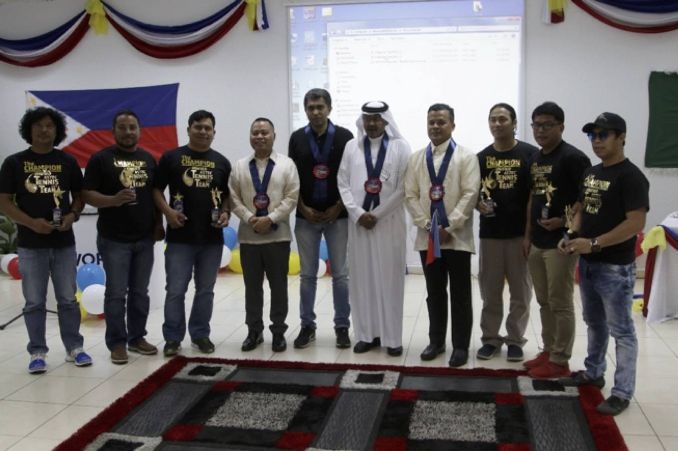 The champions, Unified ASTEC, with the guests: Hon. Herminigildo Bayot (4th from left), Binu Puthen, Taha Al Turki, and George Bornales.