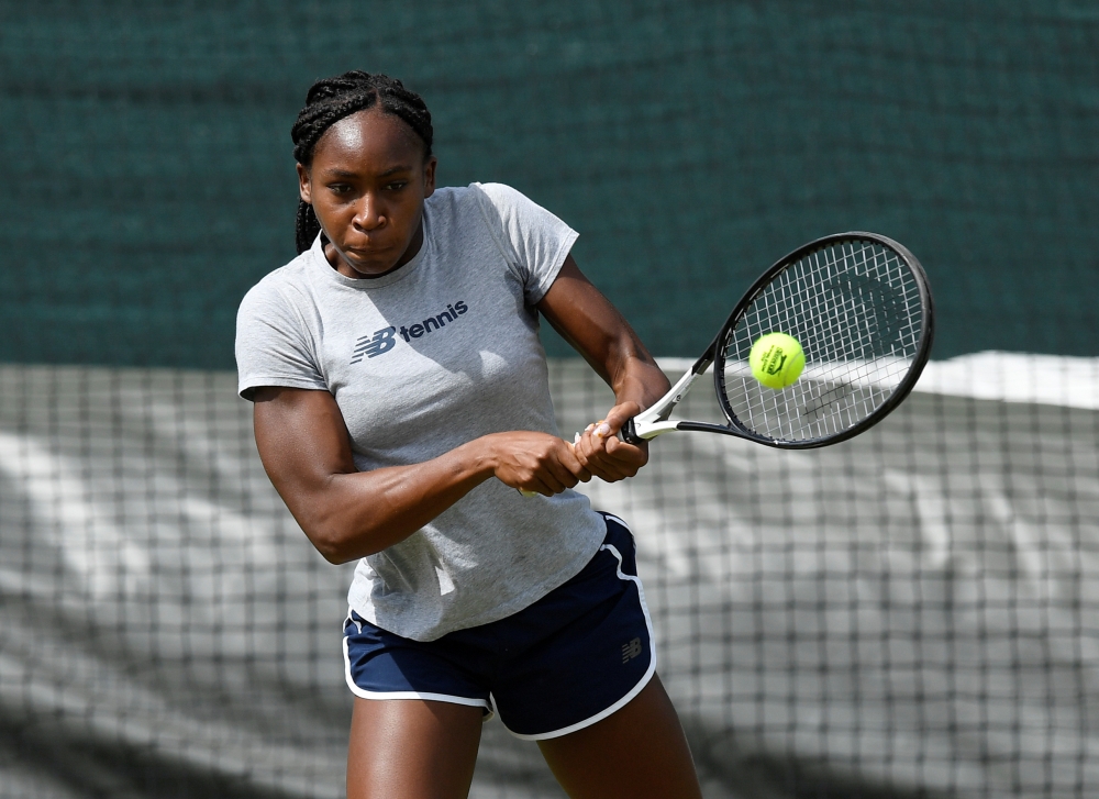 Cori Gauff of the US gestures as she arrives for a practice session at the All England Lawn Tennis and Croquet Club, London, Britain on Sunday. — Reuters