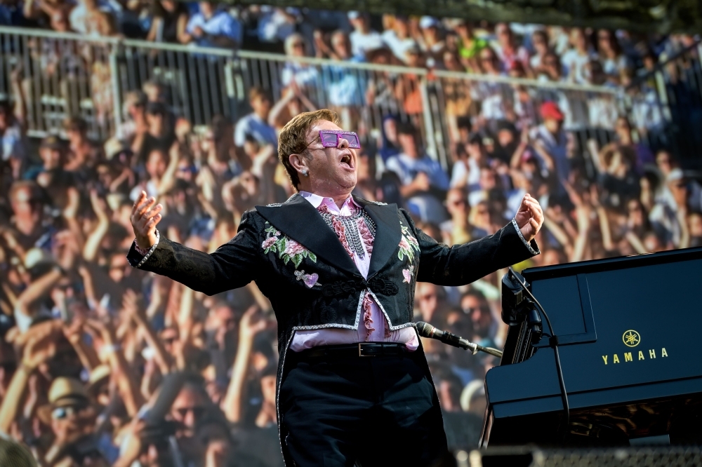 British singer-songwriter Elton John performs his Farewell Yellow Brick Road tour during the Montreux Jazz Festival in Montreux. — AFP