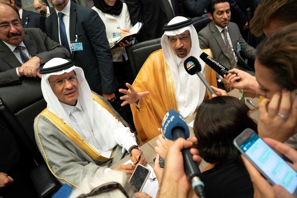 Saudi Arabia's Energy Minister Khaled Al-Falih (R) and Saudi Deputy Oil Minister Prince Abdulaziz Bin Salman talk to the press on the sidelines of the 176th meeting of the Organization of the Petroleum Exporting Countries (OPEC) conference and the 6th meeting of the OPEC and non-OPEC countries on Monday in Vienna, Austria. — AFP