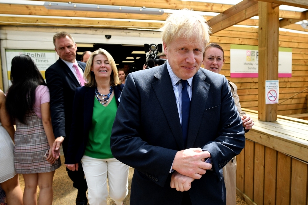 Conservative MP and leadership contender Boris Johnson takes part in a Conservative Party leadership event, at a garden center near Sevenoaks, south east England, on Monday. — AFP