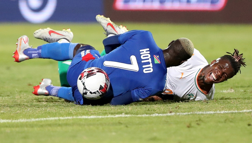 Namibia's Deon Hotto in action with Ivory Coast's Wilfried Zaha during the Africa Cup of Nations 2019 - Group D - Namibia v Ivory Coast - 30 June Stadium, Cairo, Egypt on Monday. — Reuters