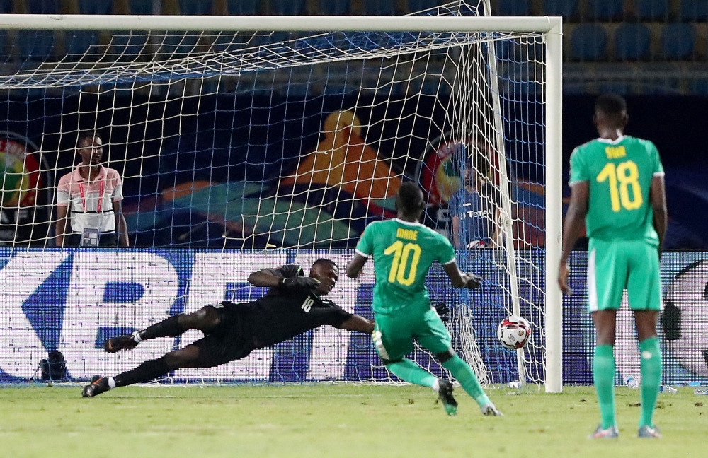 Senegal's Sadio Mane scores their third goal from a penalty during the Africa Cup of Nations 2019 Group C match against Kenya at the 30 June Stadium, Cairo, Egypt, on Monday. — Reuters