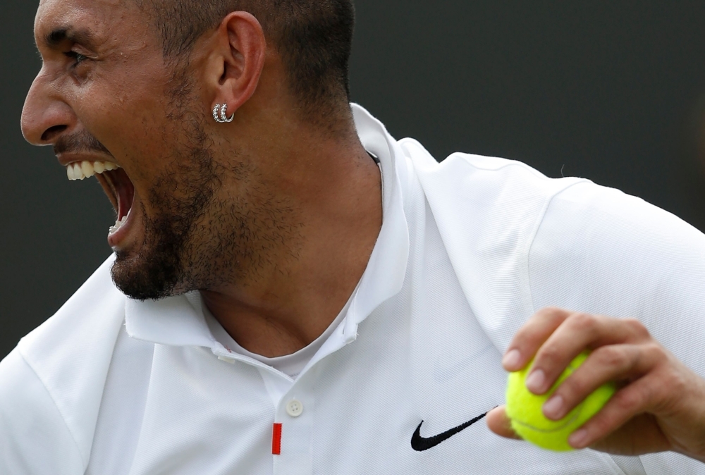Australia's Nick Kyrgios reacts during his men's singles first round match against Australia's Jordan Thompson on the second day of the 2019 Wimbledon Championships at The All England Lawn Tennis Club in Wimbledon, southwest London, on Tuesday. — AFP
