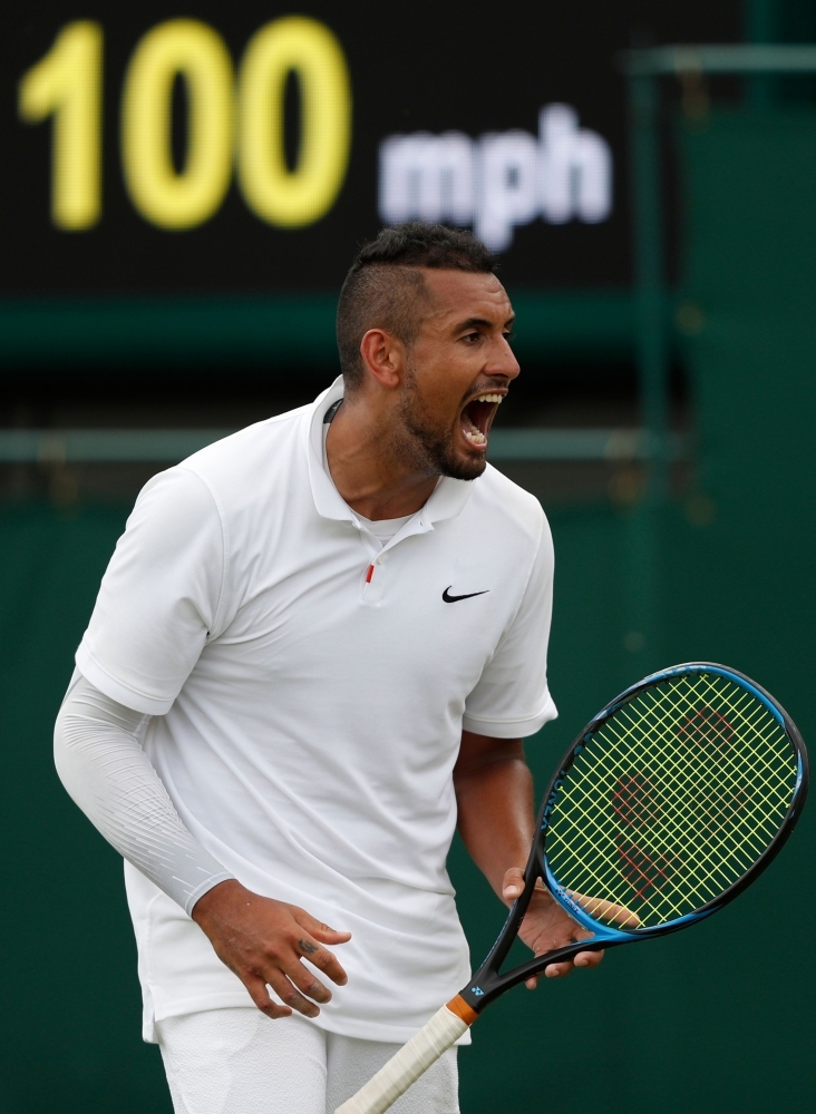 Australia's Nick Kyrgios reacts during his men's singles first round match against Australia's Jordan Thompson on the second day of the 2019 Wimbledon Championships at the All England Lawn Tennis Club in Wimbledon, southwest London, on Tuesday. — AFP
